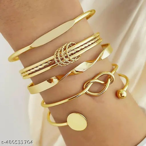 Twisted gold open bangle bracelet