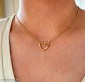 Gold heart and bow pendant necklace