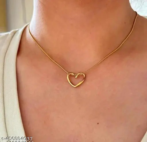 Gold heart and bow pendant necklace